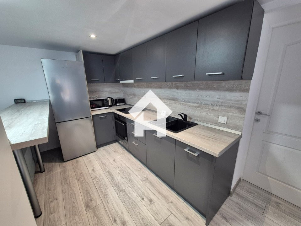 Apartament modern la casa cu curte – modern - Piata Cluj